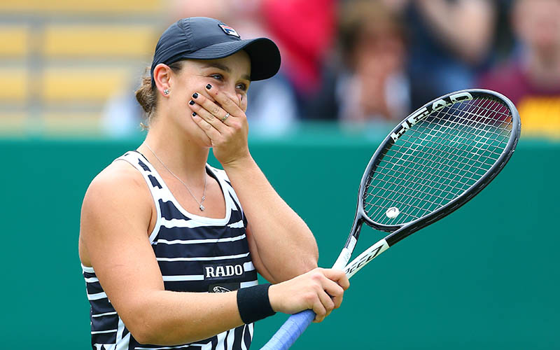 Ash Barty reacts after winning the title