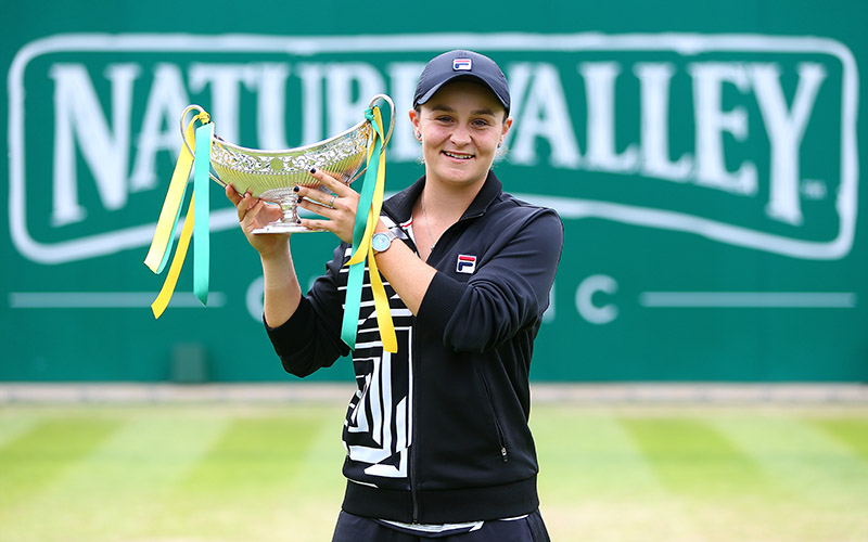 Ash Barty lifts the trophy