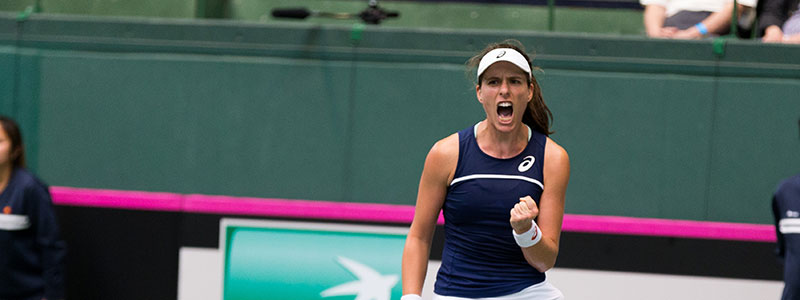 Johanna Konta of Great Britain celebrates in her Fed Cup tie against Japan