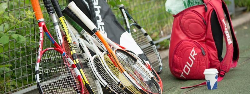 Tennis rackets on a park court
